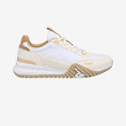 Beige and white sneaker with Kappa branding on a white background