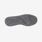 Gray shoe sole with a brand logo on a white background