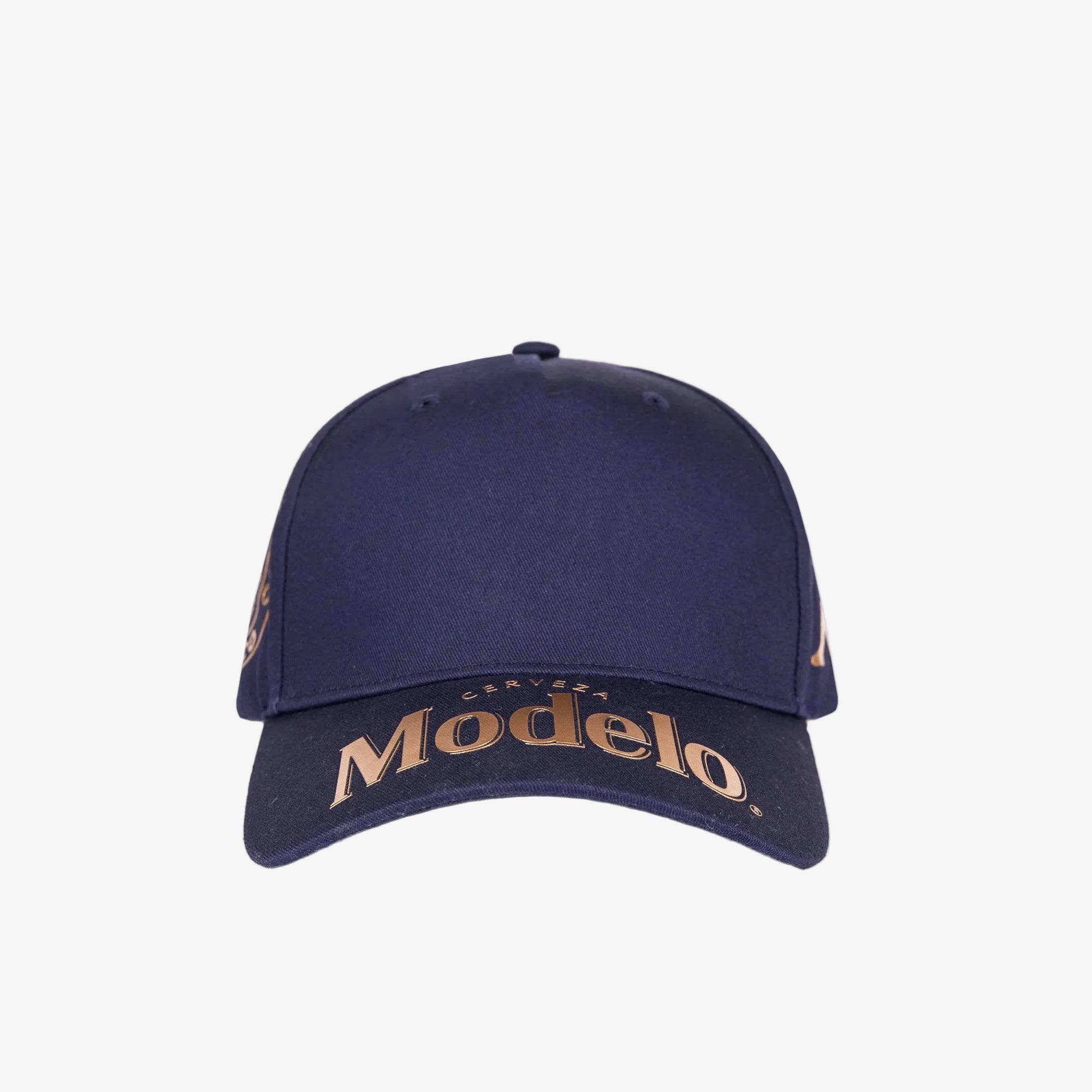 Navy blue cap with Modelo logo in gold across front bill.