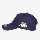 Left side of navy blue cap displaying Kappa Omini logo in gold.