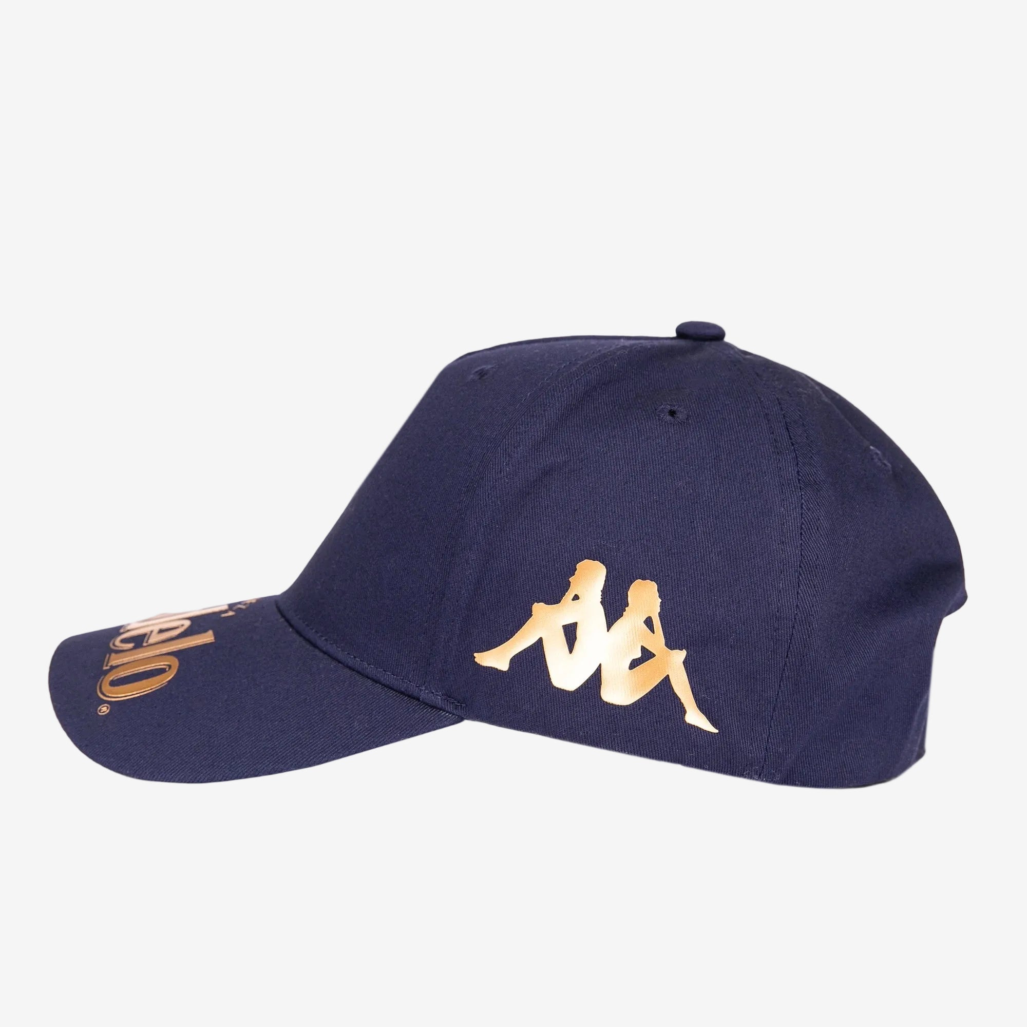 Left side of navy blue cap displaying Kappa Omini logo in gold.