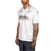 Male model wearing Kombat 2025 Modelo Soccer Jersey in white. Side view.