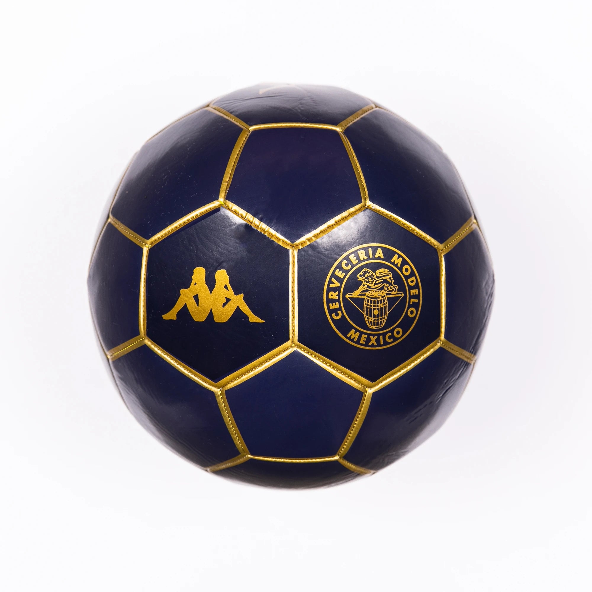 Blasty Modelo Soccer Ball in dark blue with gold details showing Modelo and Kappa logos.