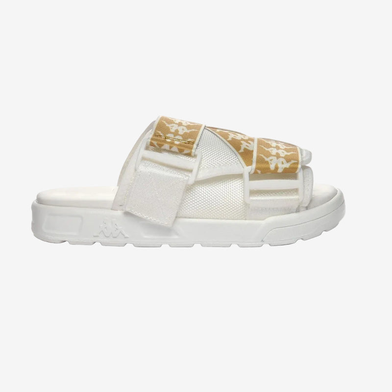 A white slide sandal with gold straps and a band featuring the Omini logo, set against a plain background.